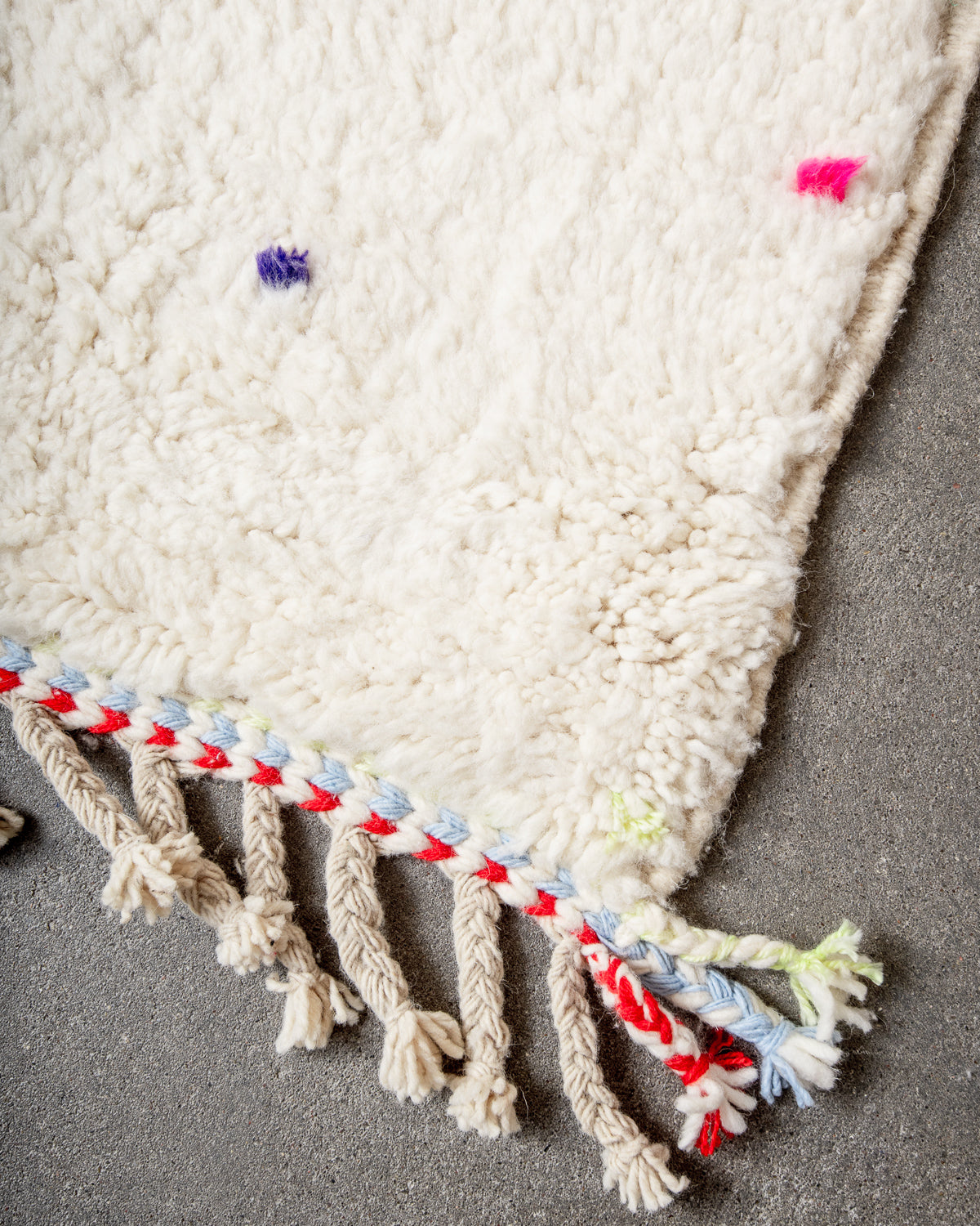 Modern, designer, handcrafted Berber rug from Morocco. Beniourain carpet with beautiful colours and patterns and fluffy wool texture.